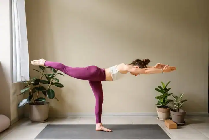 Woman doing Yoga exercise Doancaster to help with toning the body. 